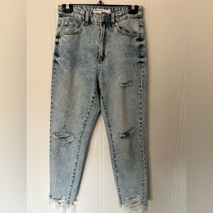 Distressed Light Blue Jeans. High waited mom jeans you can pair with anything!